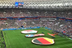 The flags of Mexico and Germany on display at the players enter the field for the start of the match.